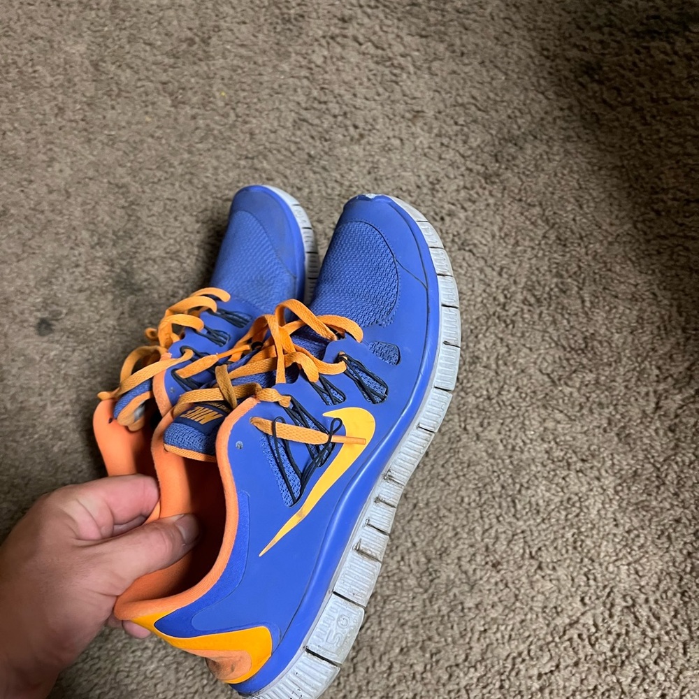 Womens size 11 mens size 9 Nike free run